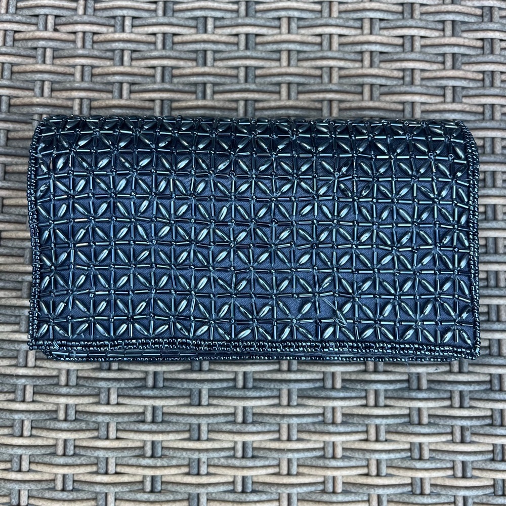Metallic Chomel Geometric Pattern Clutch with snap enclosure and inside pocket